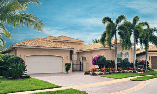 alt= "Single family home in Valencia Bay with a Mediterranean design."